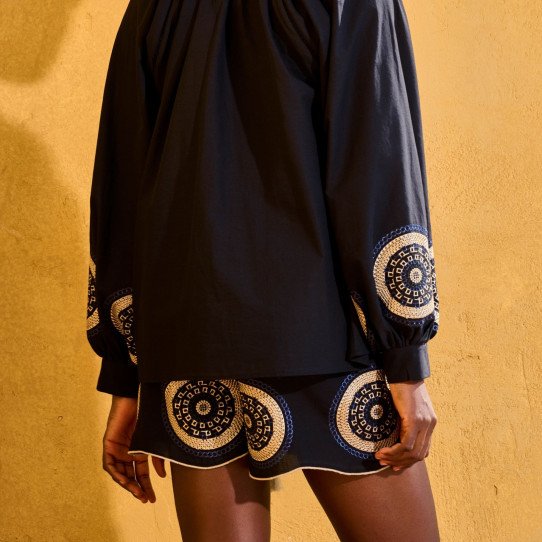 Shorts with gold details